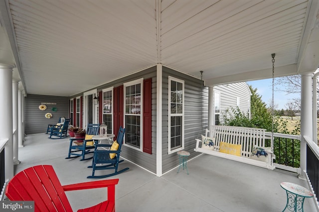 view of patio featuring a porch