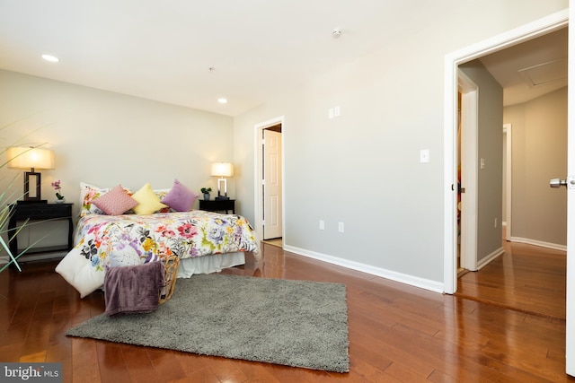 bedroom featuring recessed lighting, baseboards, and hardwood / wood-style flooring