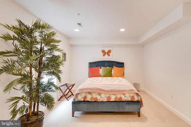 carpeted bedroom featuring visible vents, recessed lighting, and baseboards