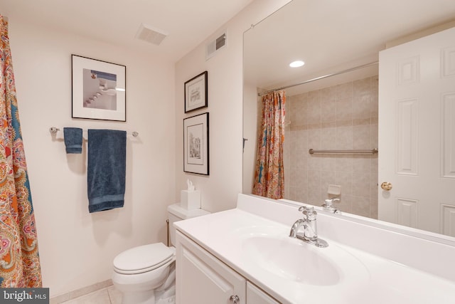 bathroom featuring toilet, visible vents, a shower with shower curtain, and vanity