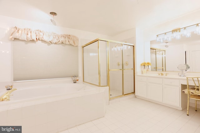 full bathroom featuring vanity, a shower stall, and a bath