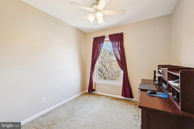 office area featuring visible vents, ceiling fan, baseboards, and carpet