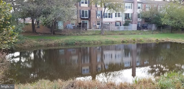 property view of water with fence