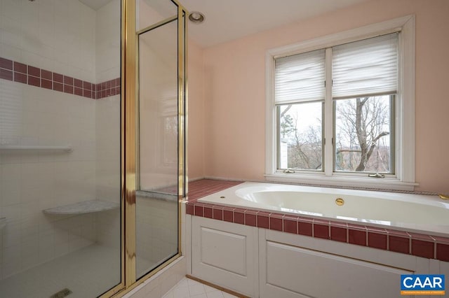 full bath with a garden tub and a shower stall