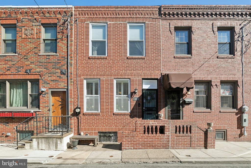 multi unit property featuring brick siding