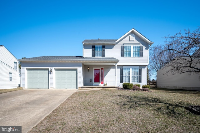 traditional home with an attached garage, driveway, and a front lawn