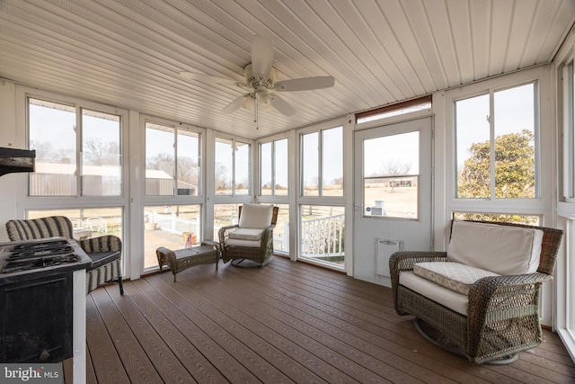 sunroom / solarium with ceiling fan