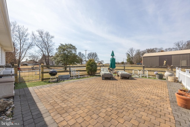 view of patio / terrace with a gate and fence