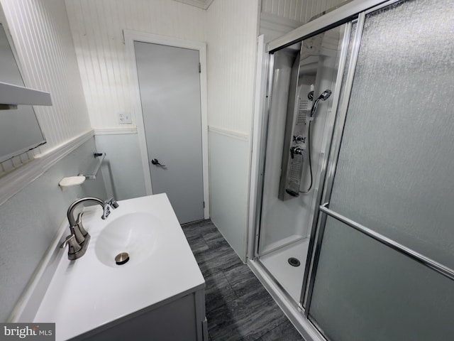 bathroom featuring vanity and a stall shower