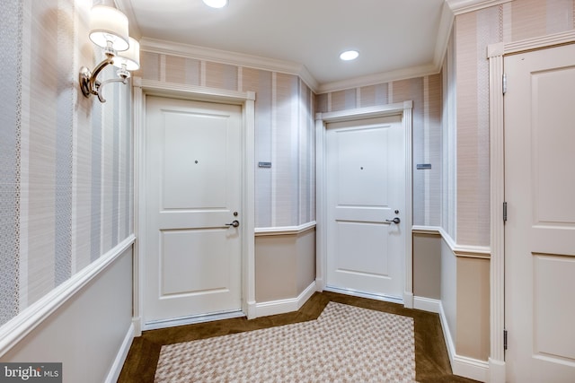 doorway with recessed lighting and baseboards