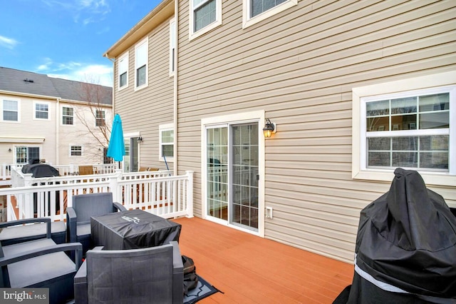 wooden deck featuring grilling area