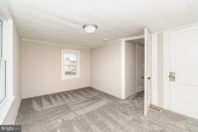 interior space featuring ornamental molding