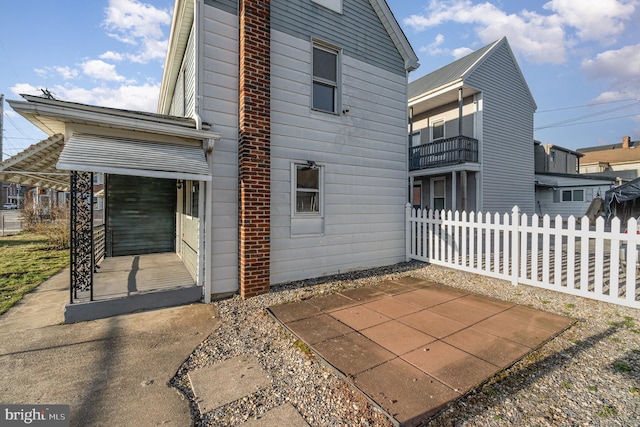 exterior space featuring a patio and fence