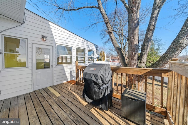 wooden terrace with area for grilling