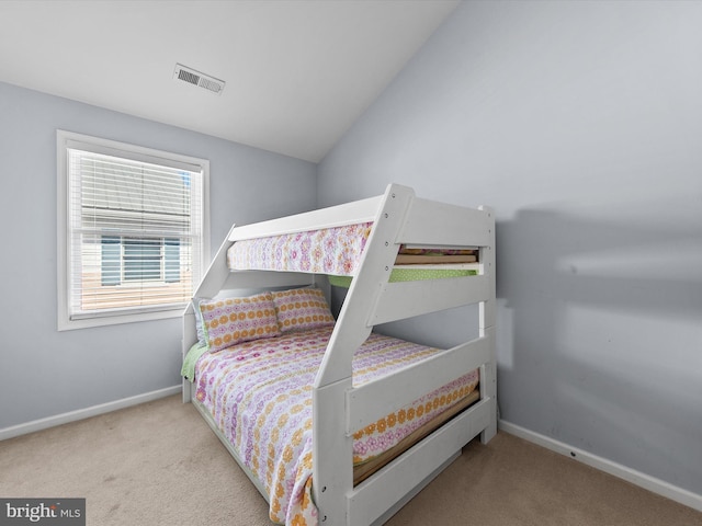 bedroom with visible vents, baseboards, and carpet