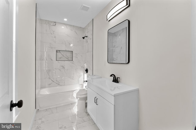 bathroom with visible vents, toilet, marble finish floor, shower / bathing tub combination, and vanity