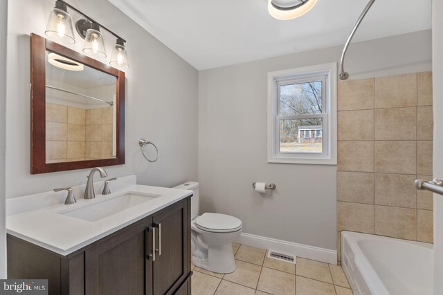 full bath featuring tile patterned flooring, visible vents, baseboards, toilet, and vanity