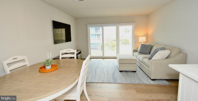 dining space featuring wood finished floors