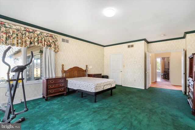 carpeted bedroom with visible vents, wallpapered walls, baseboards, and ornamental molding