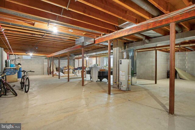 unfinished basement with water heater