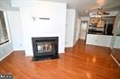 unfurnished living room with wood finished floors