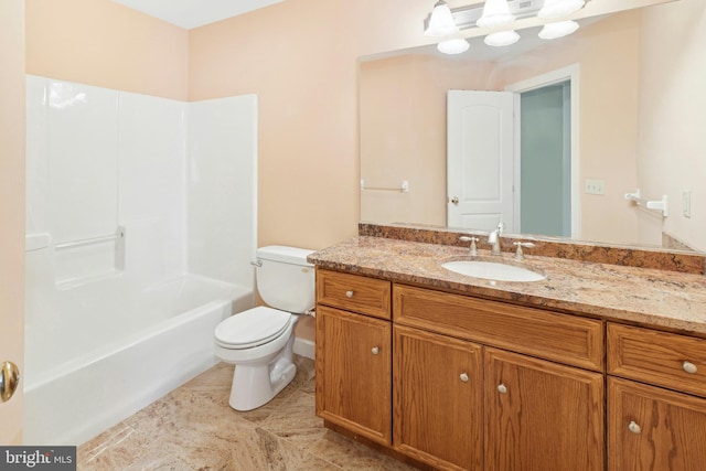 bathroom with vanity, toilet, and tile patterned flooring