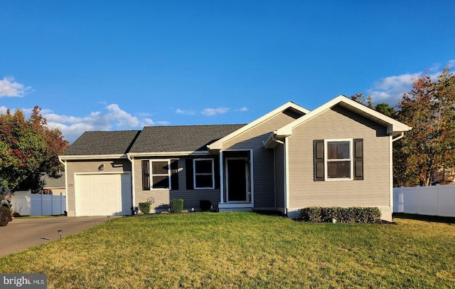 ranch-style house featuring a front lawn, fence, concrete driveway, an attached garage, and a shingled roof