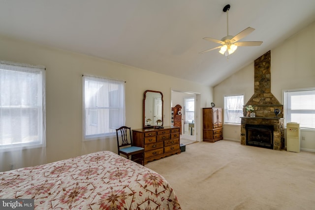 bedroom featuring high vaulted ceiling, a ceiling fan, carpet, and a fireplace