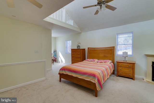 bedroom featuring lofted ceiling, carpet, and baseboards