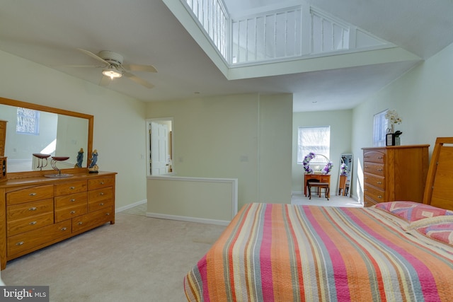 bedroom with carpet flooring, baseboards, and ceiling fan