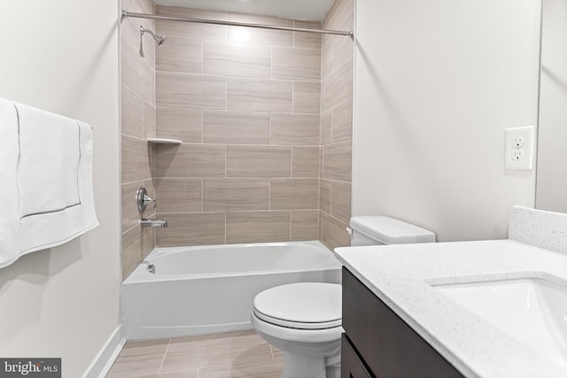 full bathroom featuring toilet, vanity, and shower / tub combination