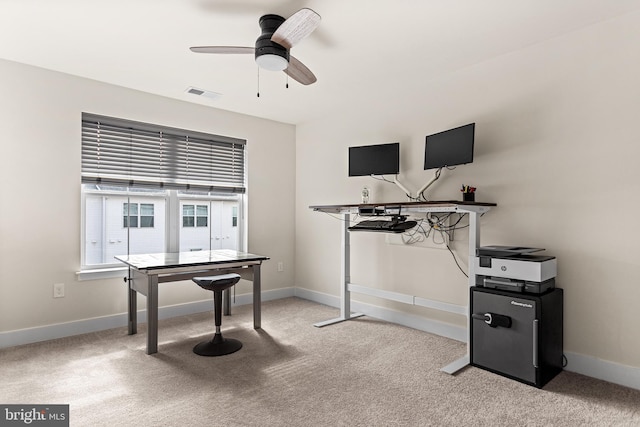 misc room featuring visible vents, baseboards, light colored carpet, and ceiling fan