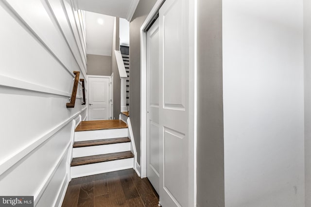 stairs with wood finished floors