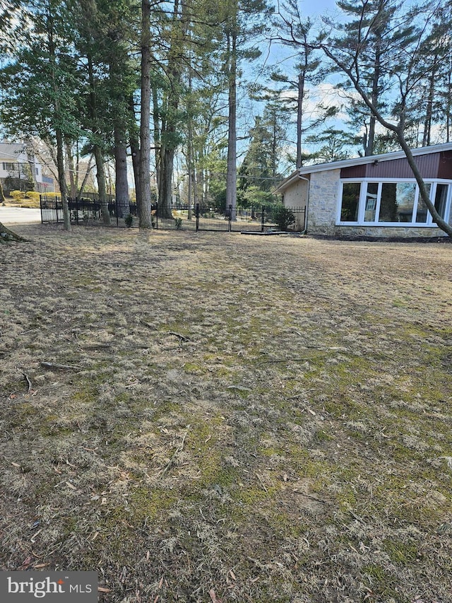 view of yard with fence