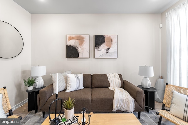 living room featuring baseboards