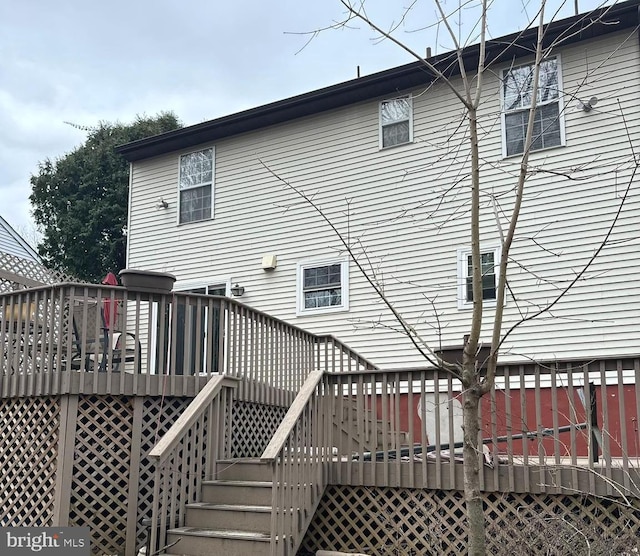 rear view of property with a deck