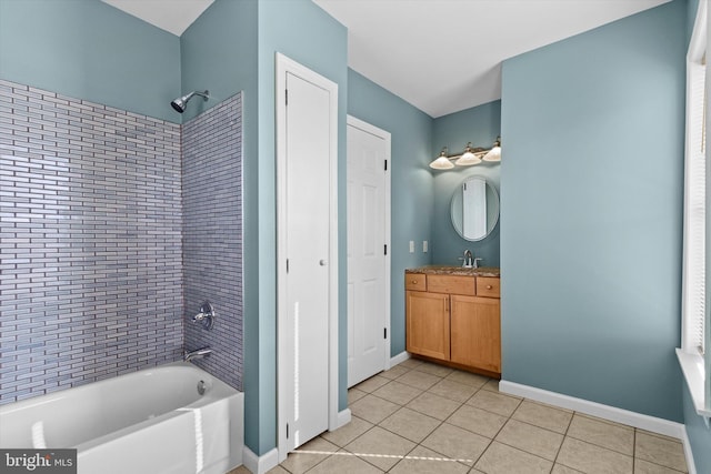 full bathroom featuring tile patterned floors, vanity, bathing tub / shower combination, and baseboards