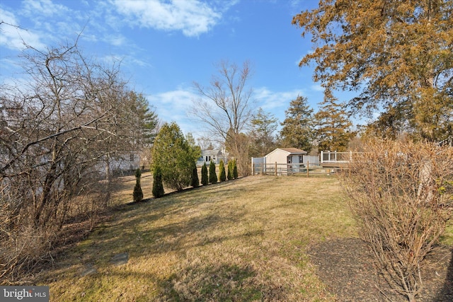 view of yard featuring fence