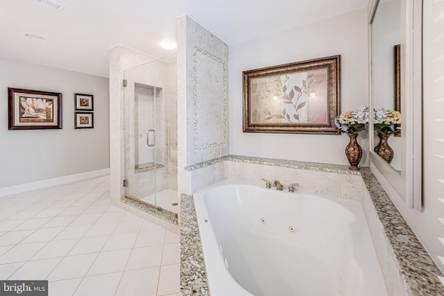 bathroom with tile patterned flooring, a shower stall, baseboards, and a whirlpool tub