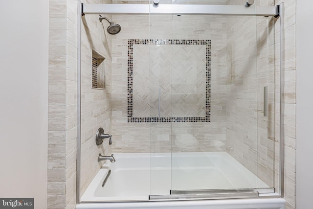 full bath with bath / shower combo with glass door