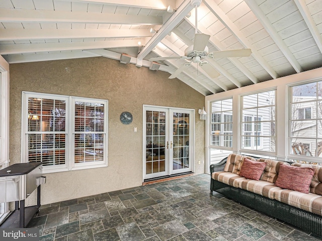 sunroom with lofted ceiling with beams, wood ceiling, french doors, and ceiling fan