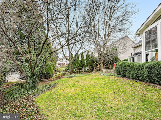 view of yard with fence