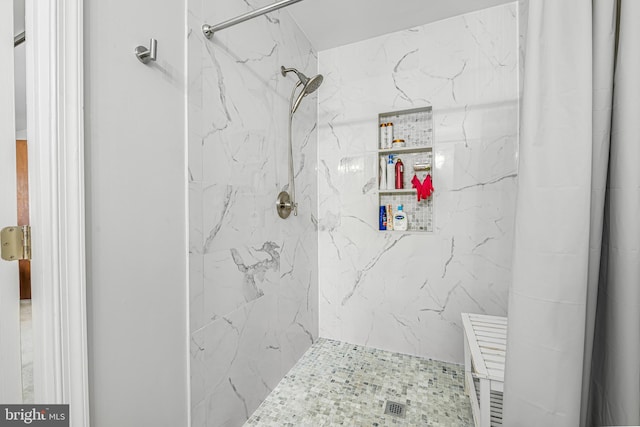 bathroom featuring walk in shower