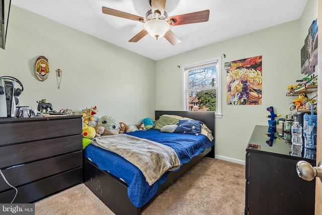 bedroom featuring baseboards, carpet, and ceiling fan