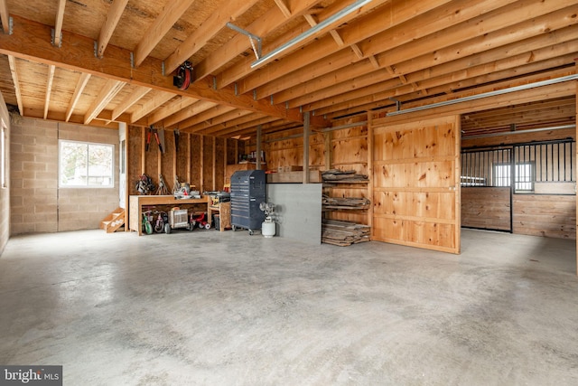 interior space featuring concrete block wall