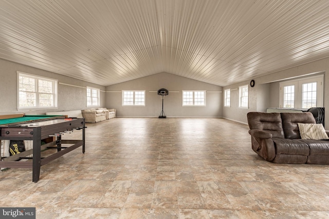 rec room with vaulted ceiling, billiards, and french doors