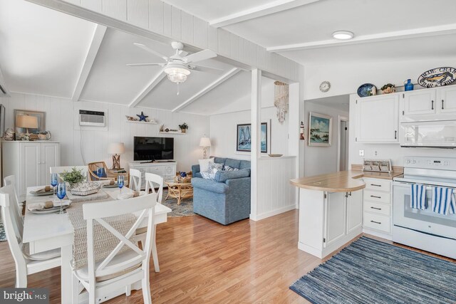 kitchen featuring white appliances, a wall mounted AC, lofted ceiling with beams, light wood-style flooring, and light countertops