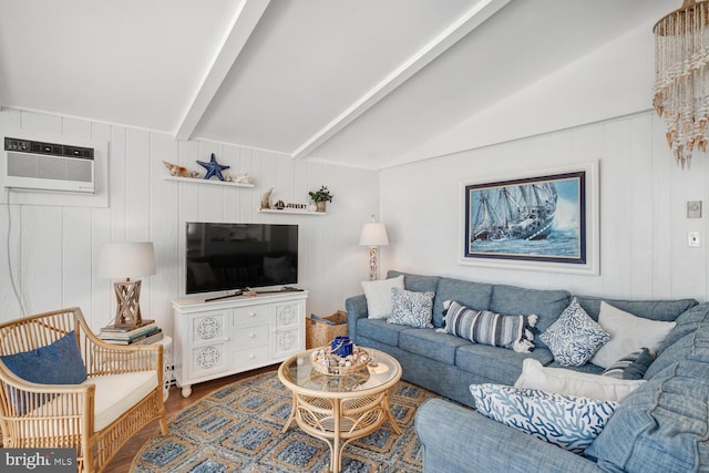 living room with vaulted ceiling with beams, a wall mounted AC, and wood finished floors