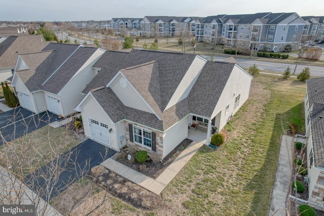 drone / aerial view featuring a residential view