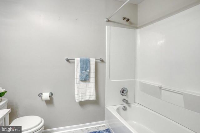 full bath with vanity, shower / tub combination, toilet, and baseboards